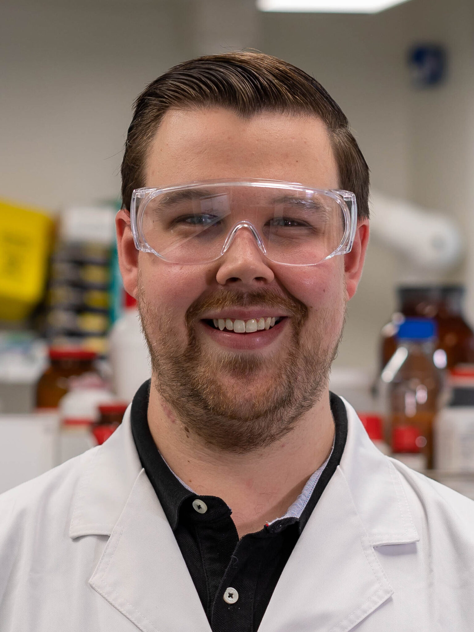 Smiling scientist in laboratory